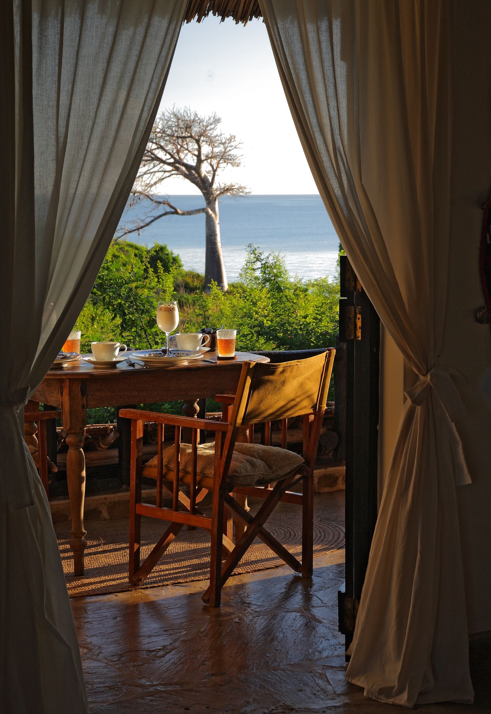 Image may contain Dining Table Furniture Table Architecture Building Dining Room Indoors Room Chair and Nature