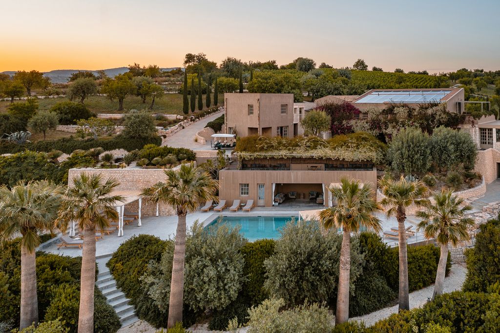 Not far from Noto on a hillside combed by olive and citrus groves lies Country House Villa Dorata a modern iteration of...