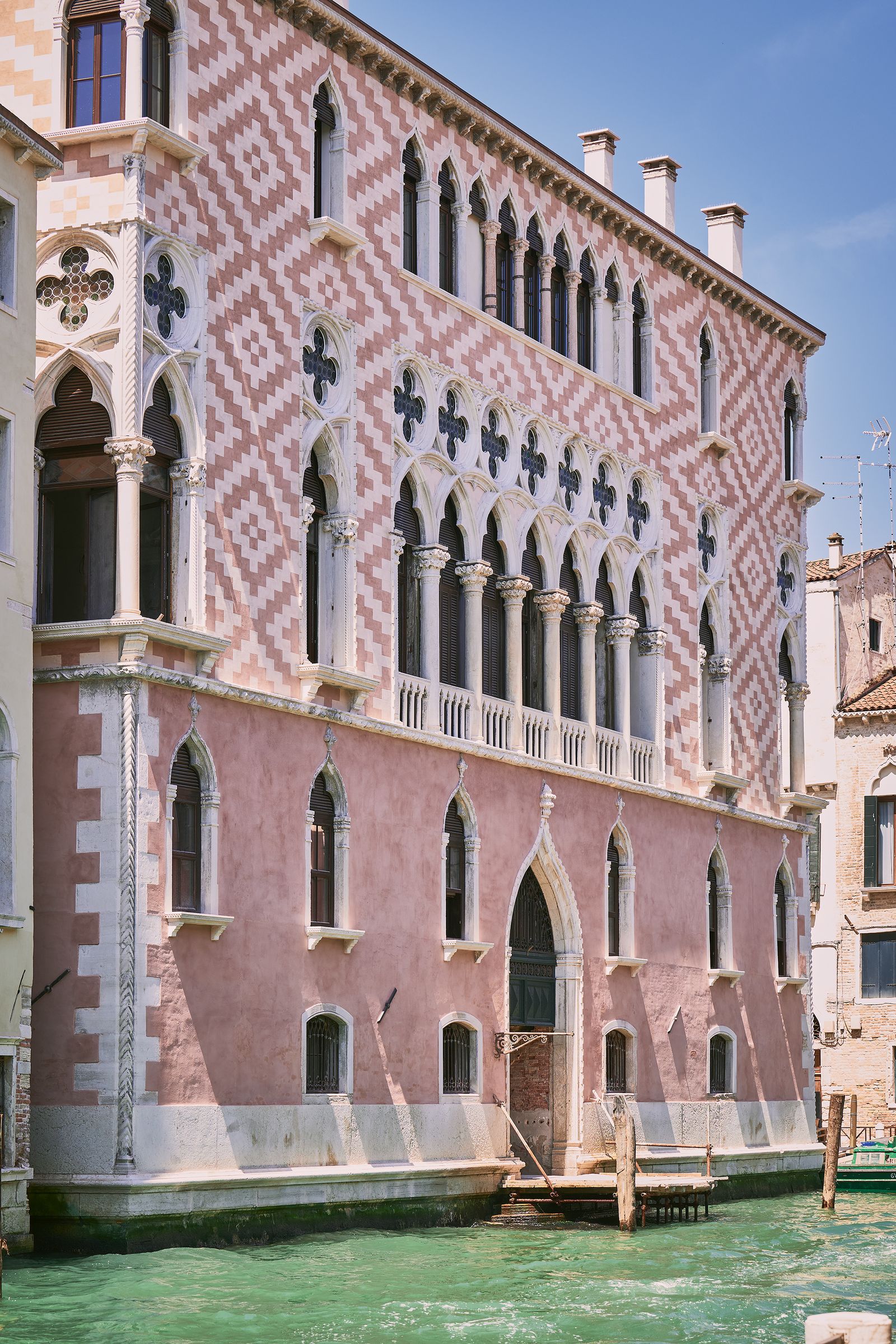 Image may contain Arch Architecture Gothic Arch Building and City