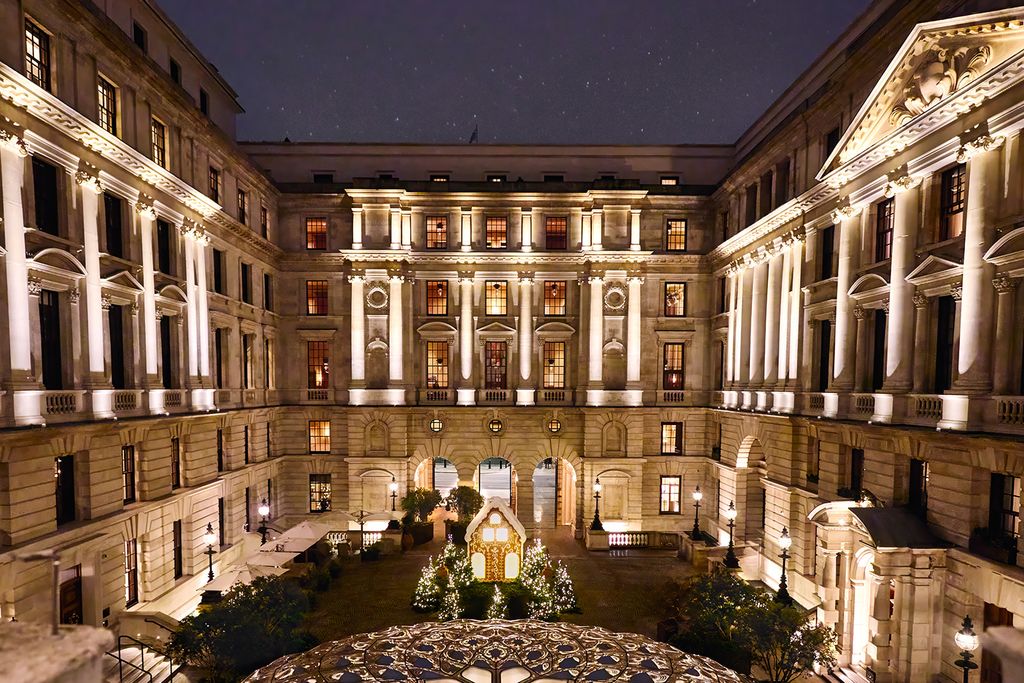 Image may contain Lighting Architecture Building Housing Urban Christmas Christmas Decorations Festival and House