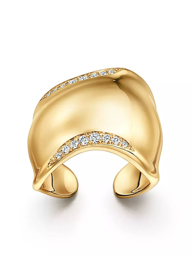 Image may contain: Cuff, Gold, Accessories, and Jewelry